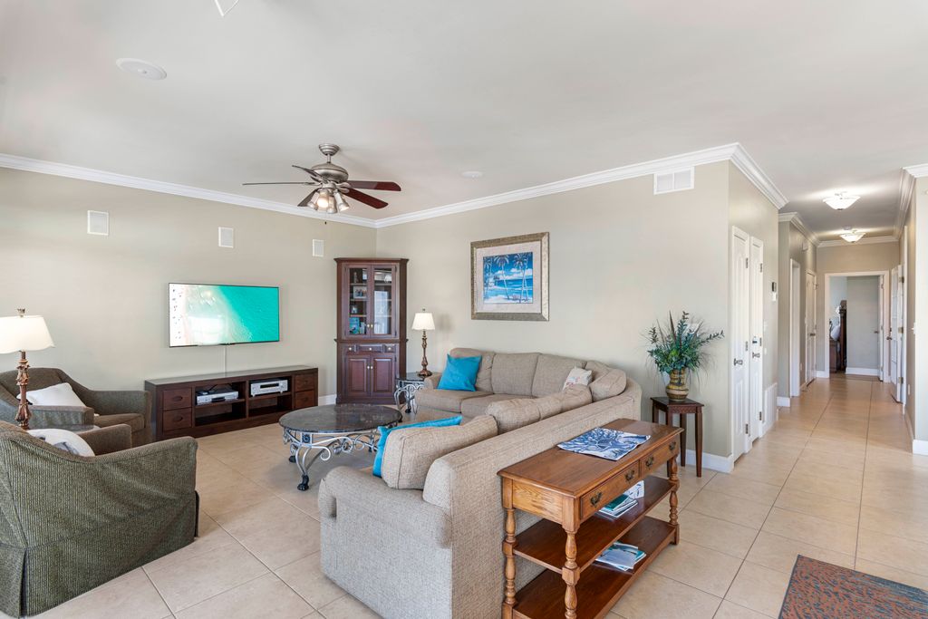 Third Floor: Living Room – Open-concept living room, bright and comfortable with plenty of seating.