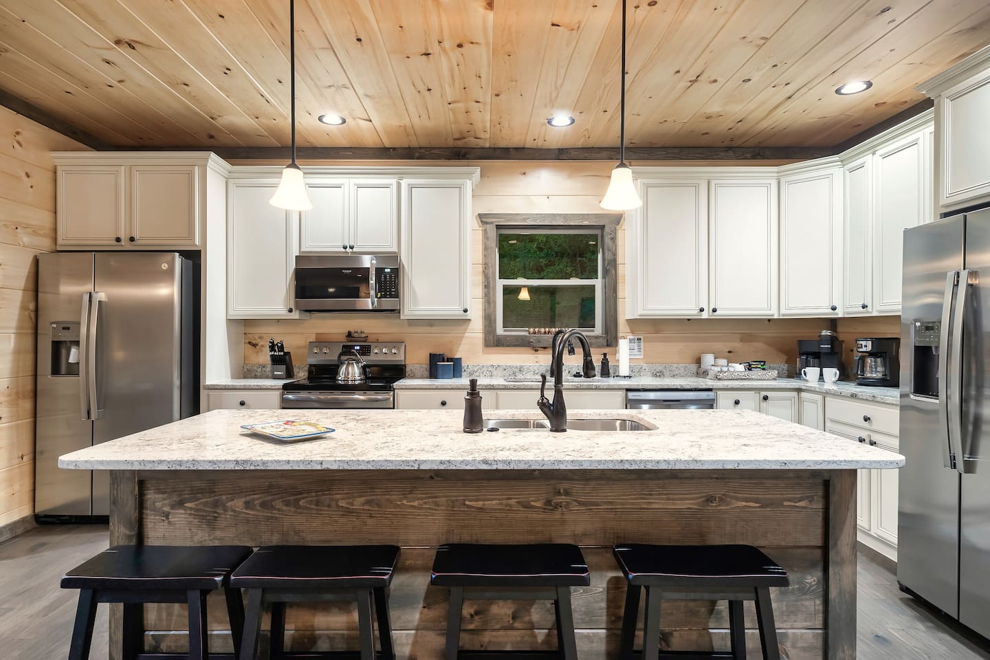 Two sinks, two refrigerators and two dishwashers!  Beautiful cabinets and granite.