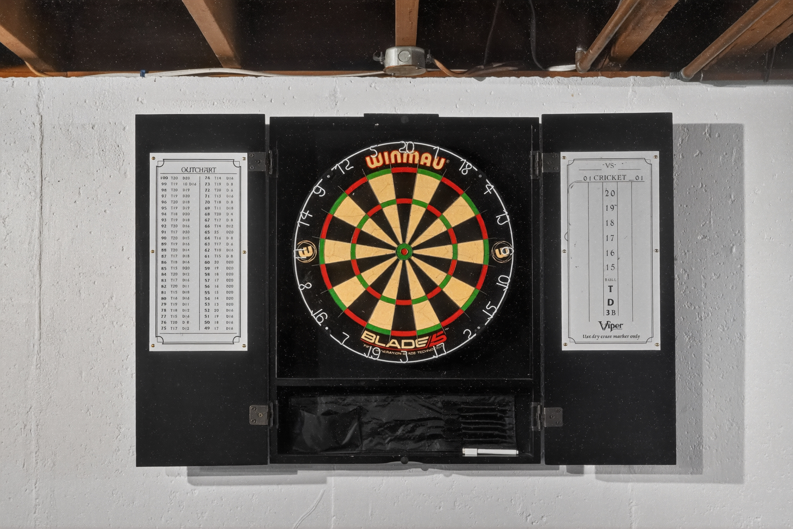 Unwind and have fun in the basement game area with darts!