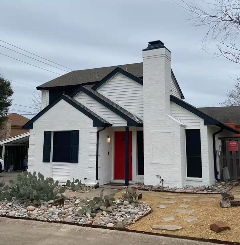 Exterior view of home with private driveway and modern design.