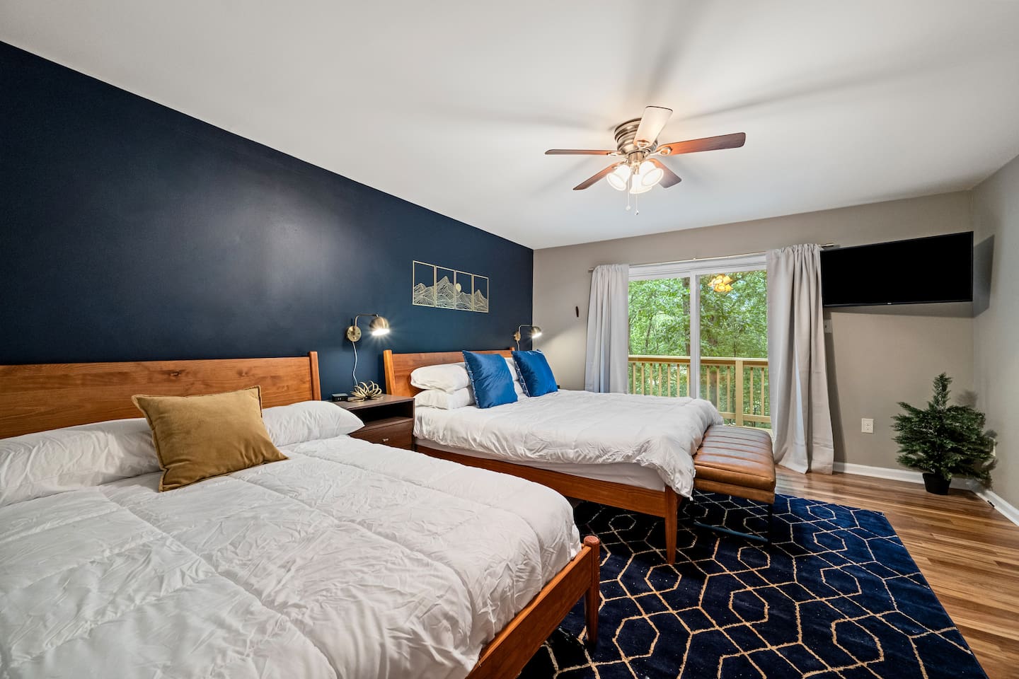 [Bedroom 2] - one king bed and one full bed.  Sliding glass door leads directly to a shared deck with bedroom 1.