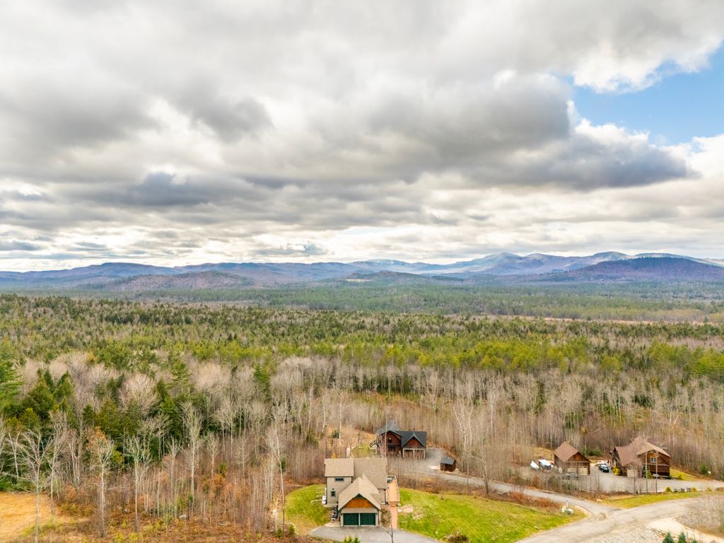 See the full property and surroundings from above.