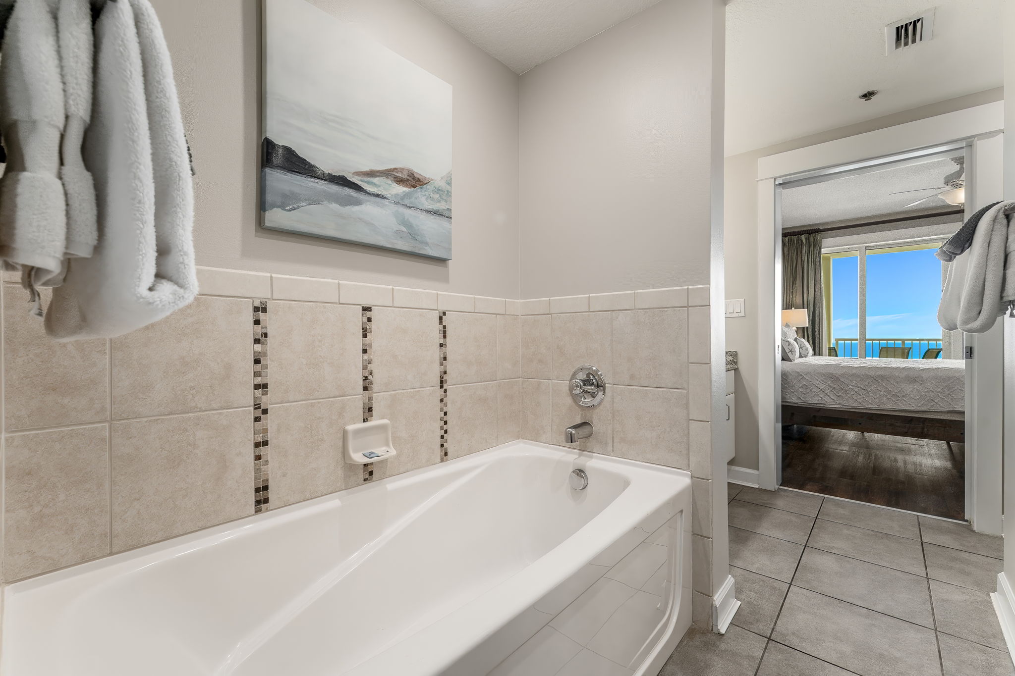 Separate tub and shower in master bathroom.