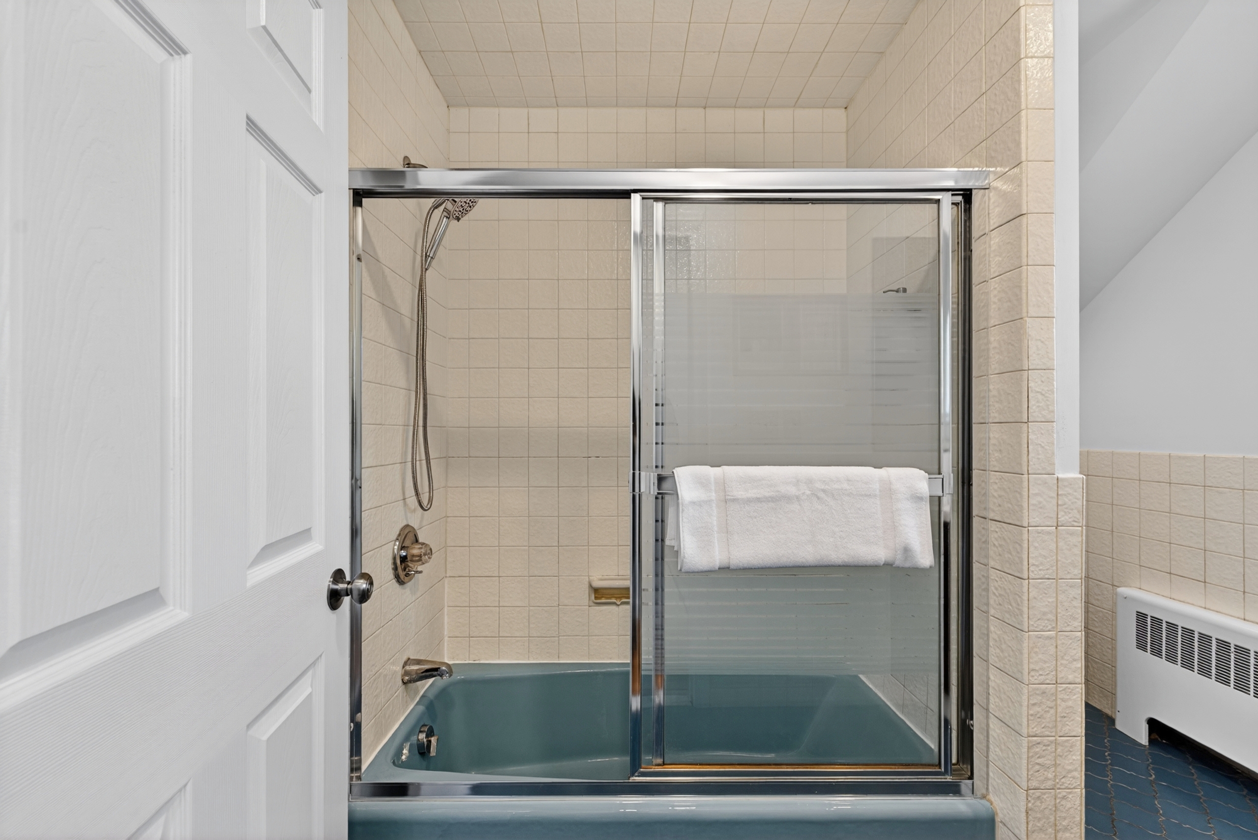 Full spacious bathroom designed for comfort and convenience with ample space and essential amenities.