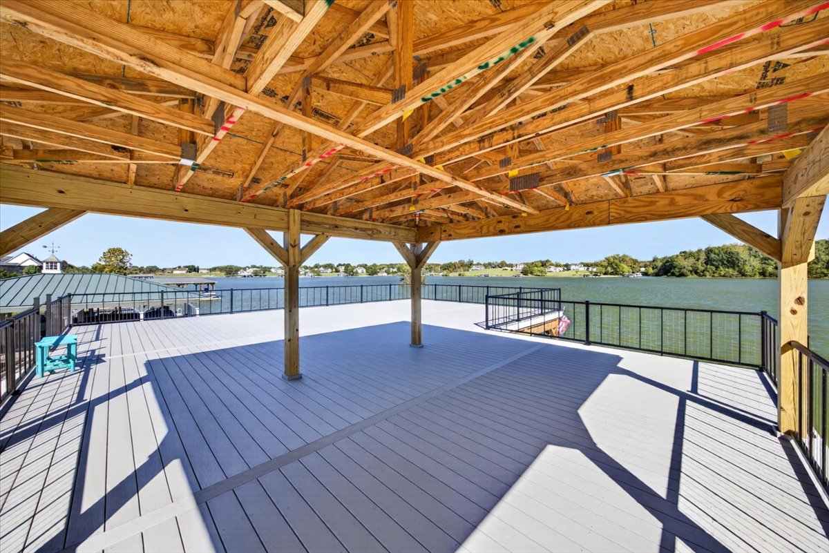 Covered rooftop pavilion provides a shaded gathering space surrounded by beautiful lake views.