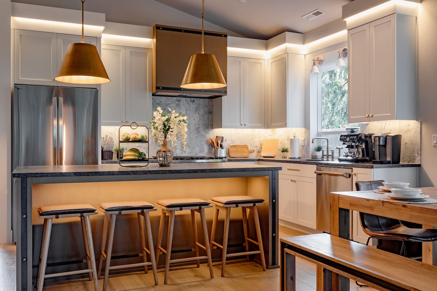 Welcome to the kitchen! We have a Breville espresso machine, Keurig, Kitchenaid mixer, Allclad waffle maker, Vitamix blender, rice cooker, pressure cooker, Zojirushi griddle, and a set of premium Cangshan knives. 