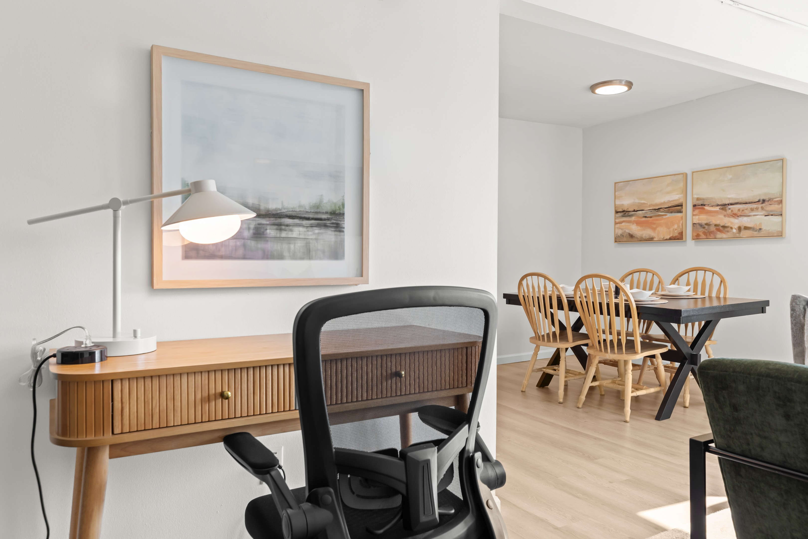 Dedicated work area with a desk and ergonomic chair—ideal for remote work or study sessions.
