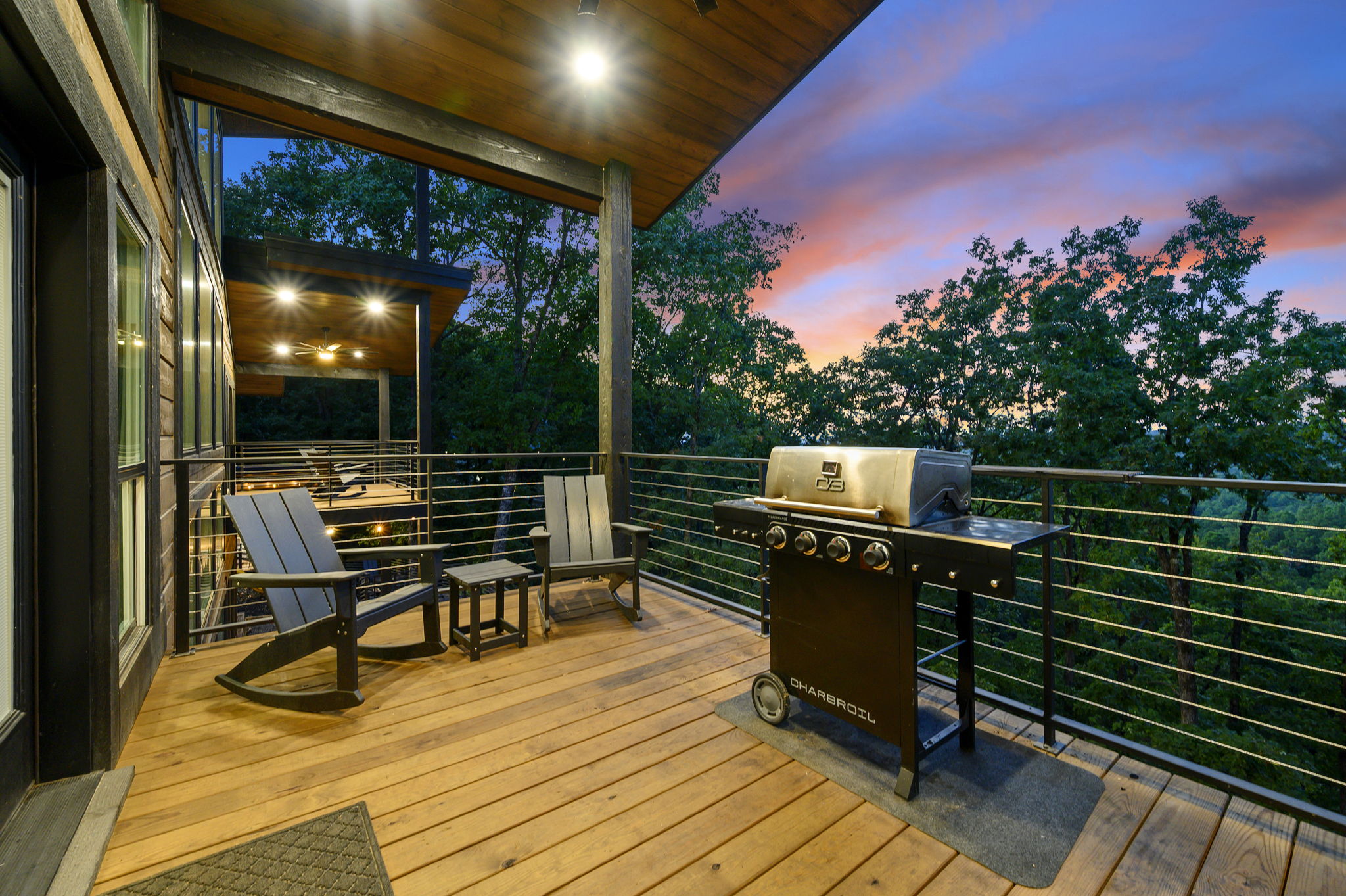 Grill dinner, watch TV, enjoy drinks at the bar, and take in the views from the upper-level deck.