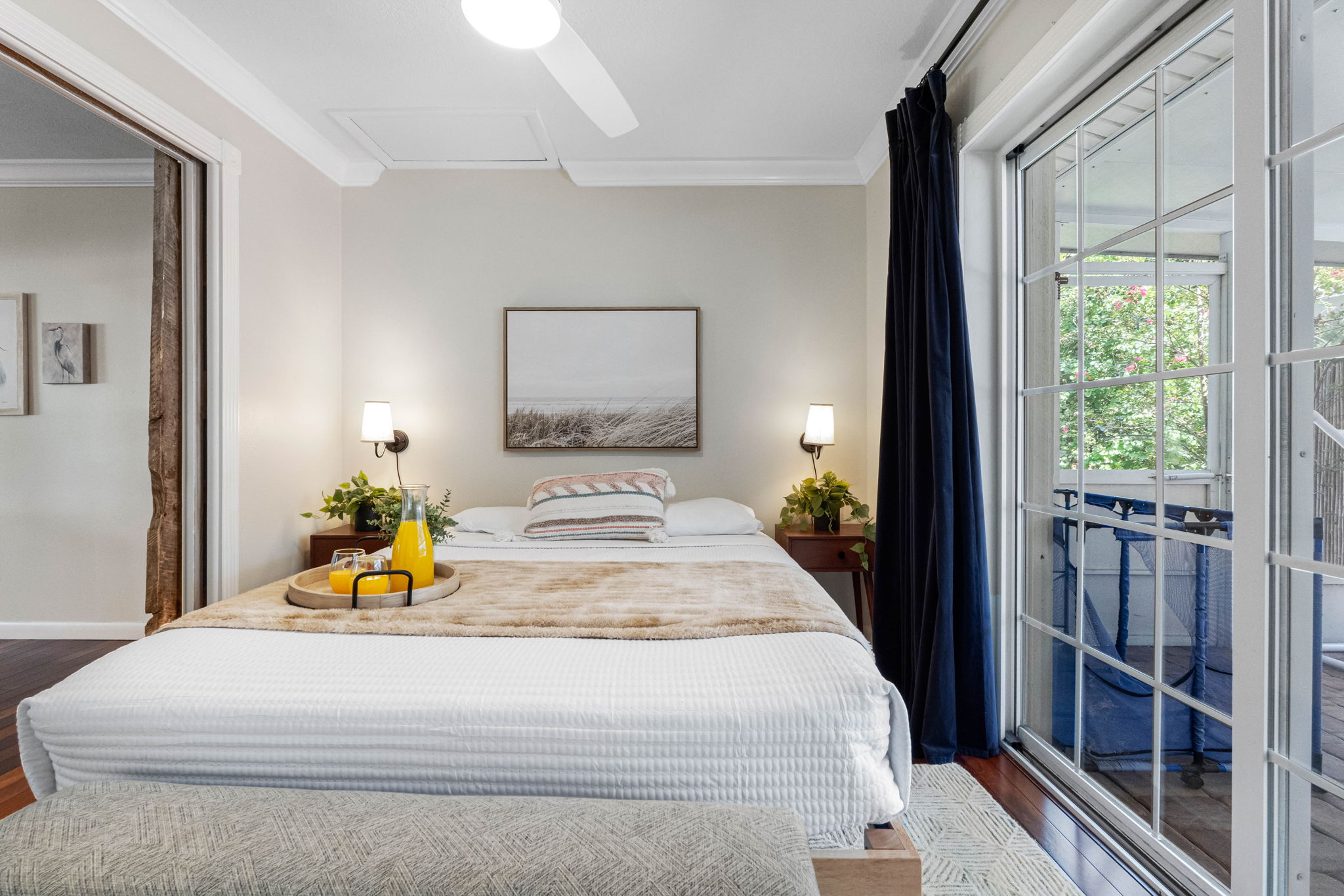 Bedroom designed with comfort in mind, featuring soft linens and peaceful accents.