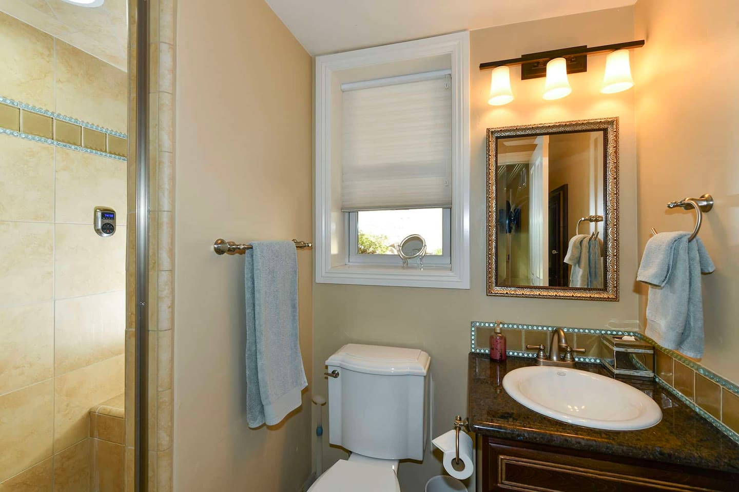 Bedroom suite 4 with living area, kitchenette, queen bed and full bathroom.