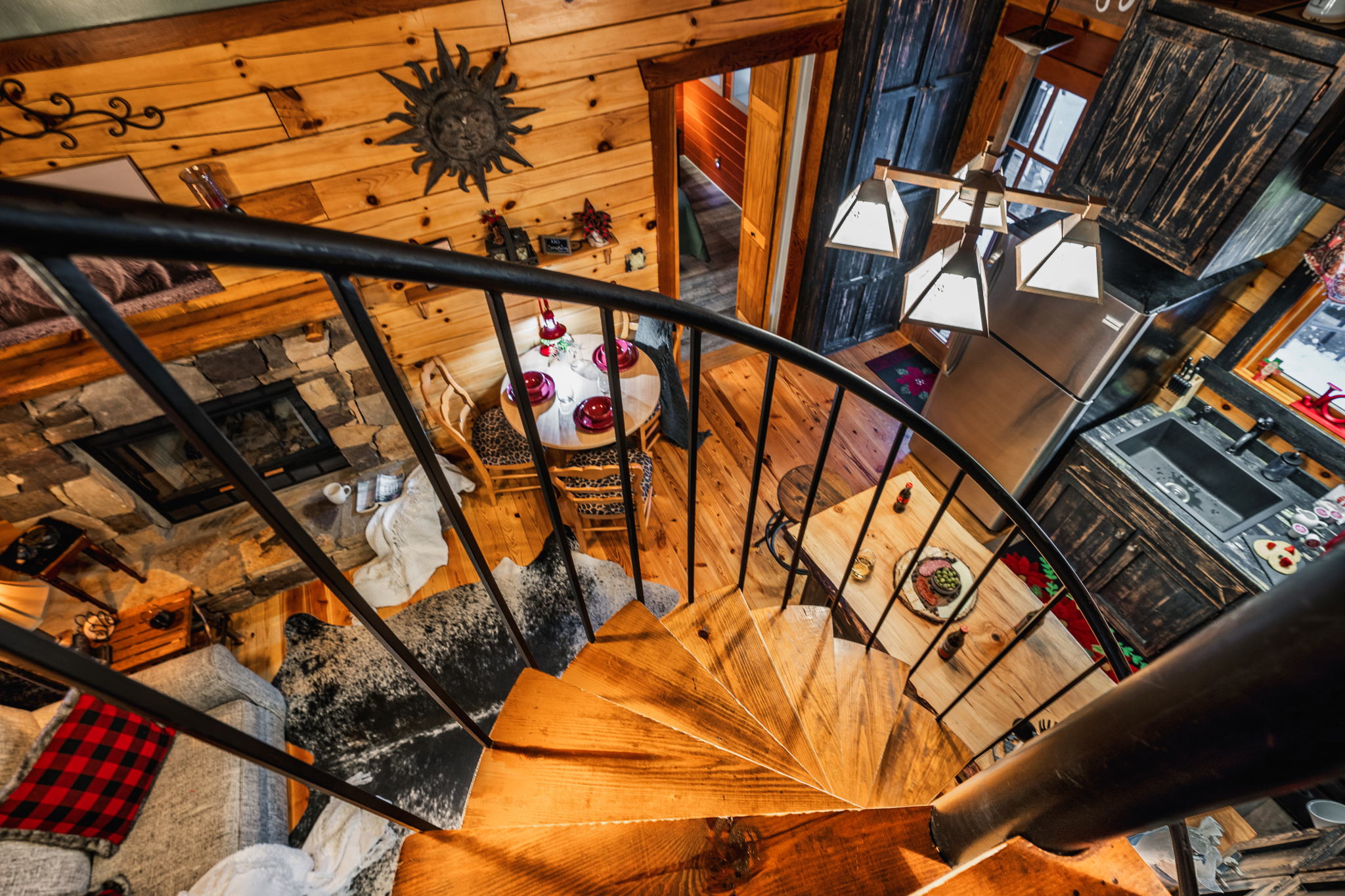 One-of-a-kind spiral staircase leads you down from the loft onto the main floor