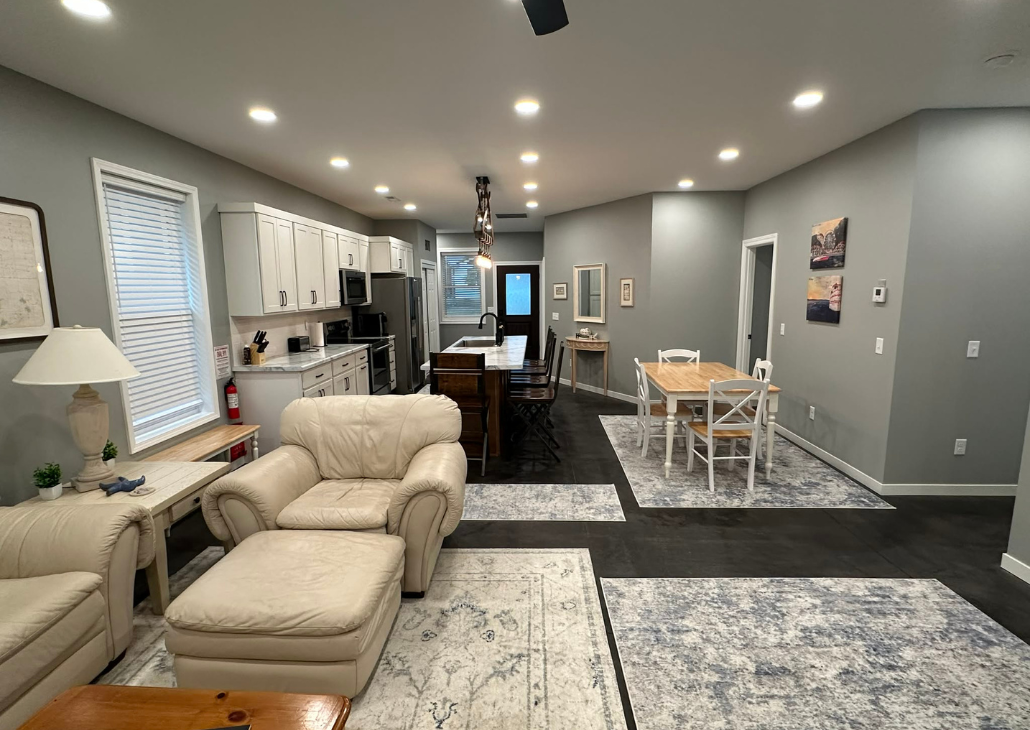 NEW HOUSE: Living room into the kitchen.