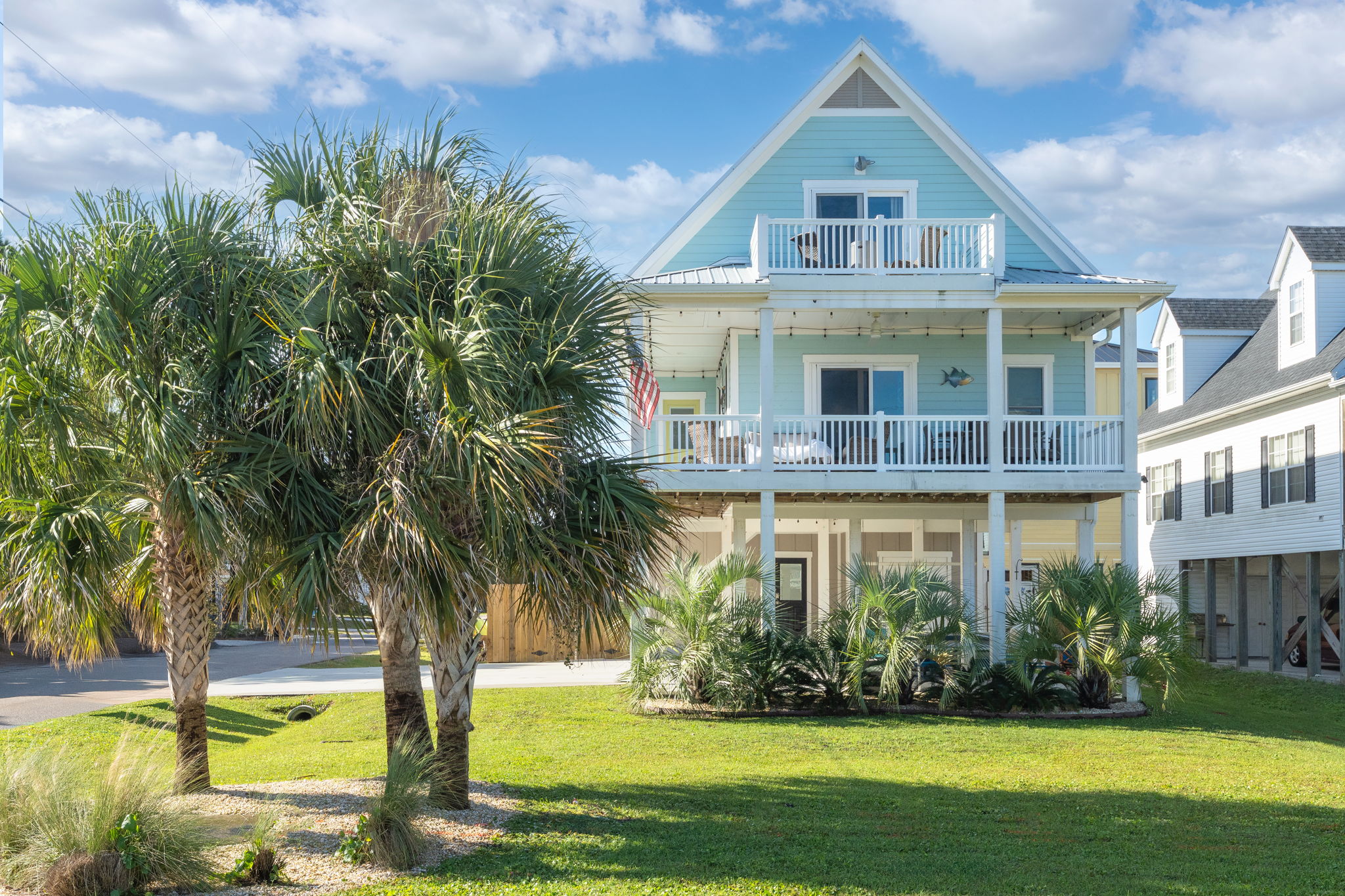 Bright, coastal, and designed for gathering — your home base at Carolina Beach.