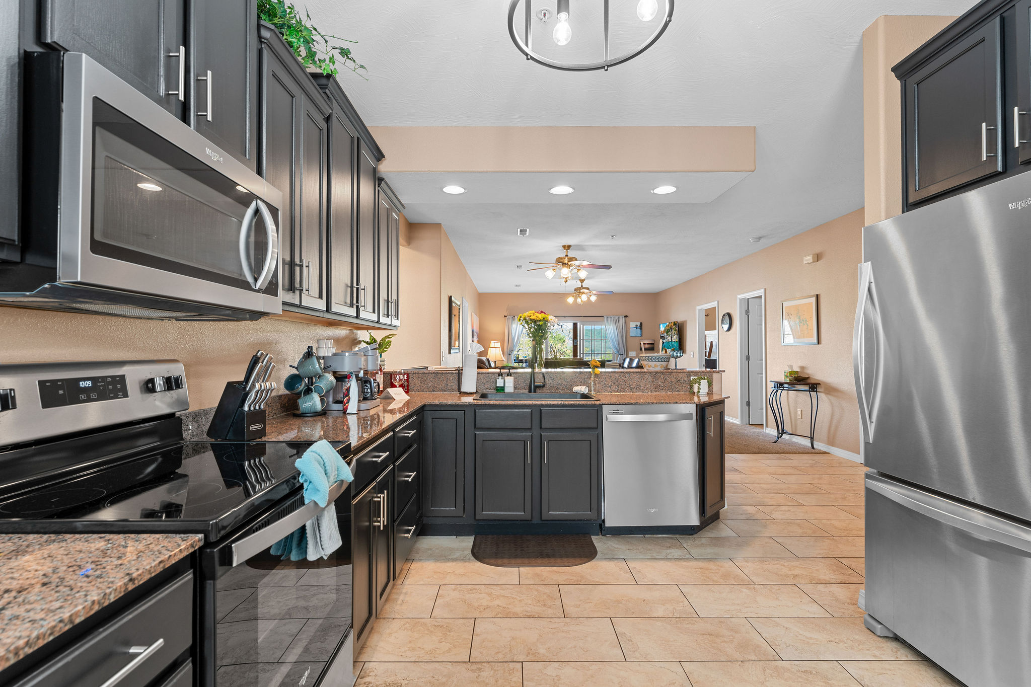 Enjoy preparing meals together in the spacious and fully stocked kitchen