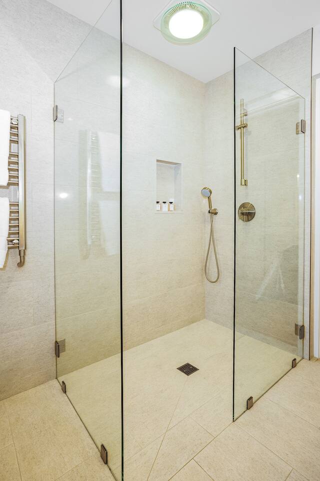Bathroom 1 with walk-in shower.