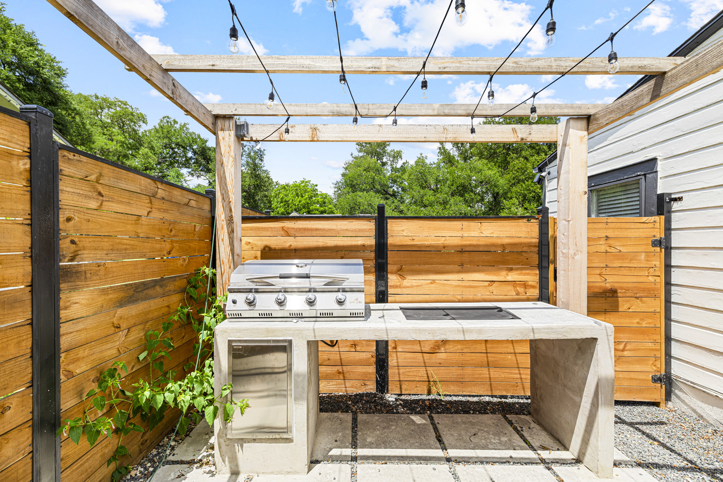 Sizzle up delicious meals under twinkling lights in your private retreat!