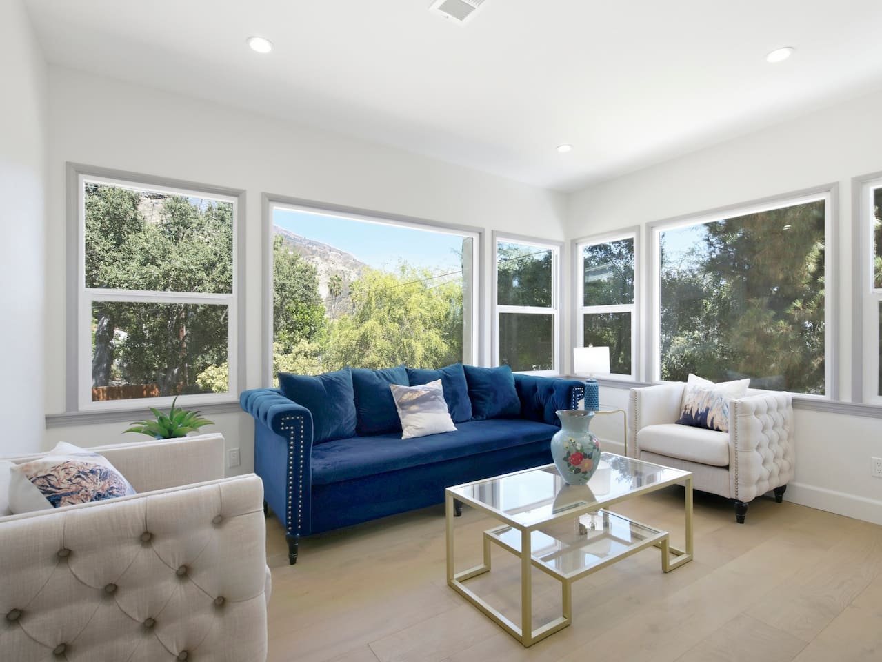 Sink into the comfortable seating and enjoy the welcoming ambiance of this beautifully crafted house.