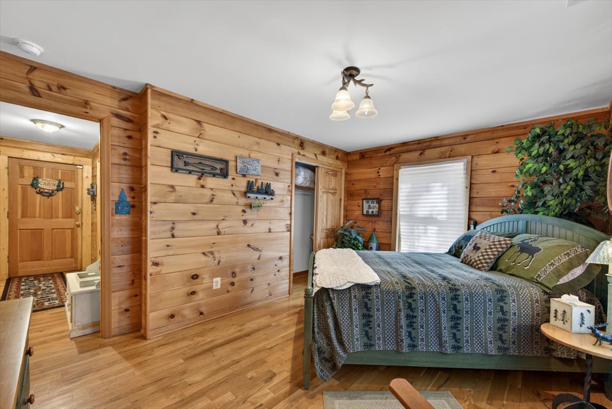 Comfortable queen bedroom with convenient main floor access.