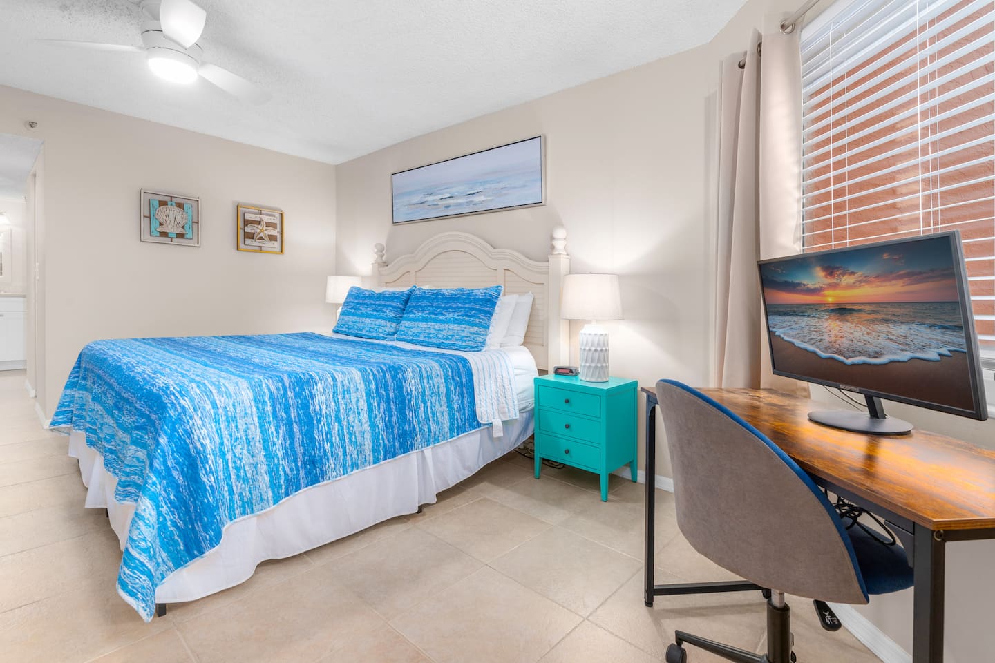 King suite with 50-inch Smart TV and dedicated work space.
