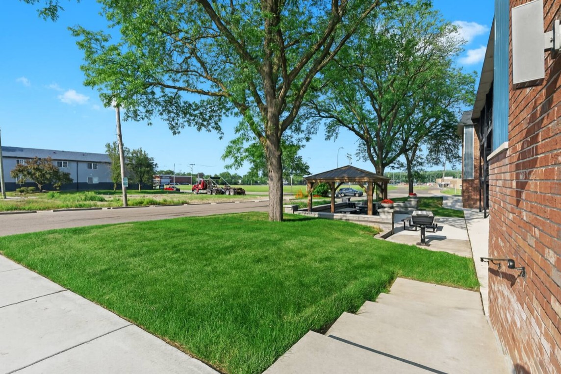 Landscaped lawns and tidy walkways enhance your arrival and offer curb appeal.