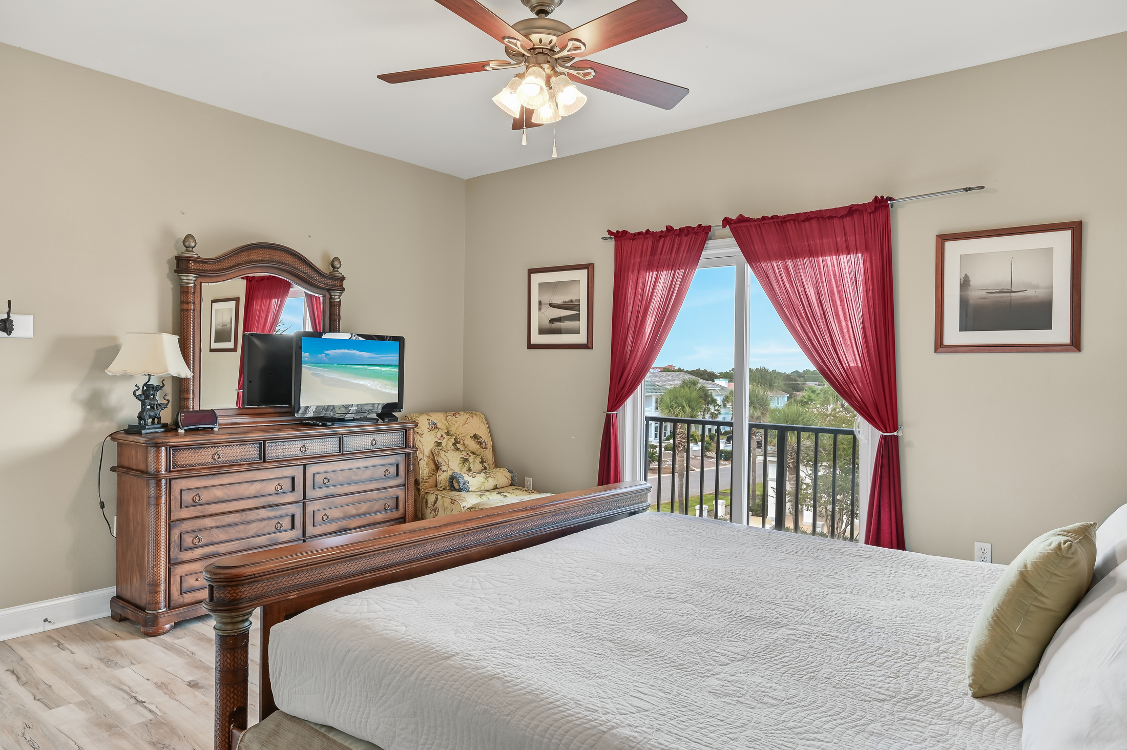 BEDROOM #4 + BATHROOM #4: King Bed with night stands, dresser, and TV. This bedroom has a private ba