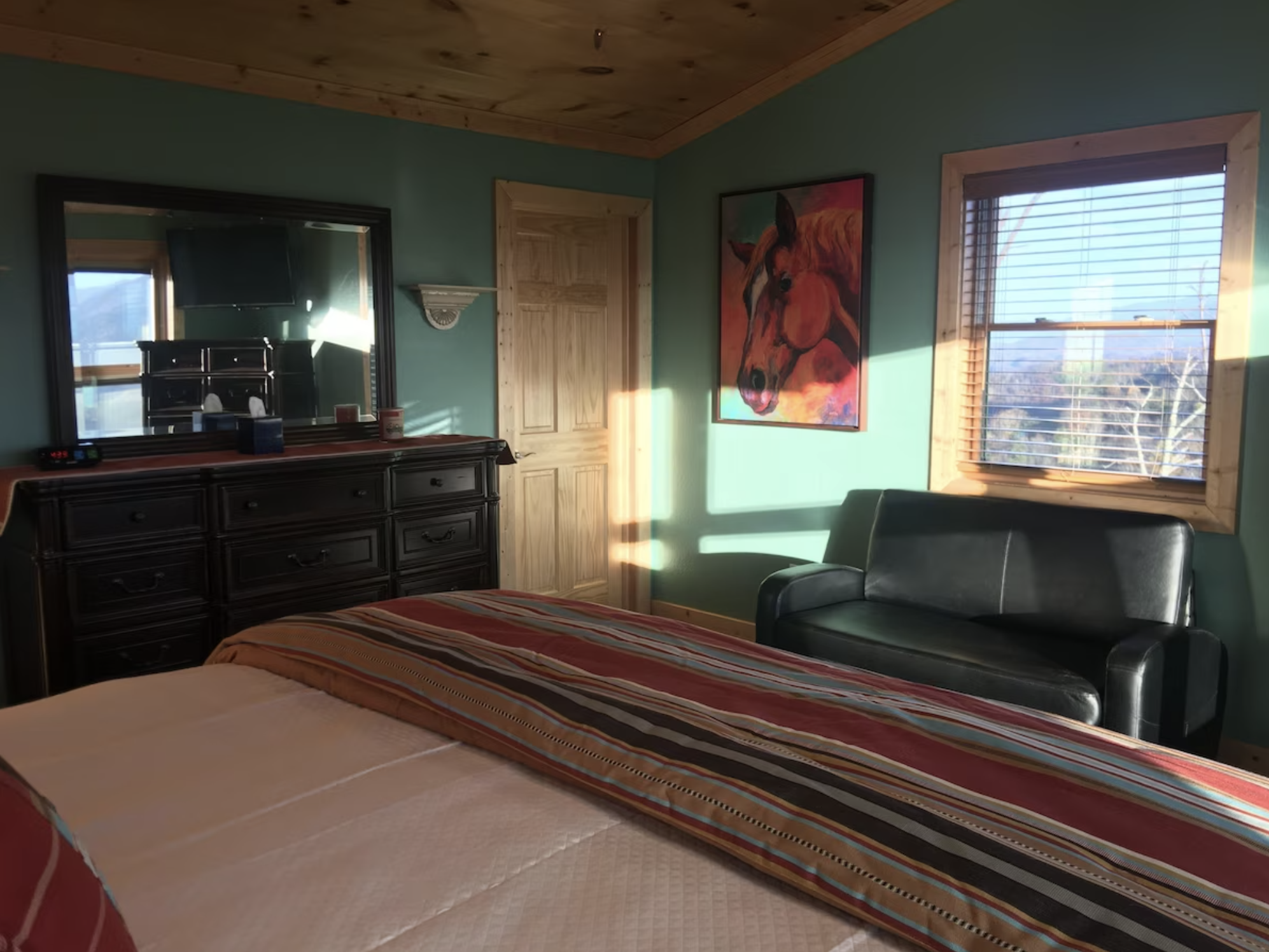 The Wild Horses room has a king bed as well