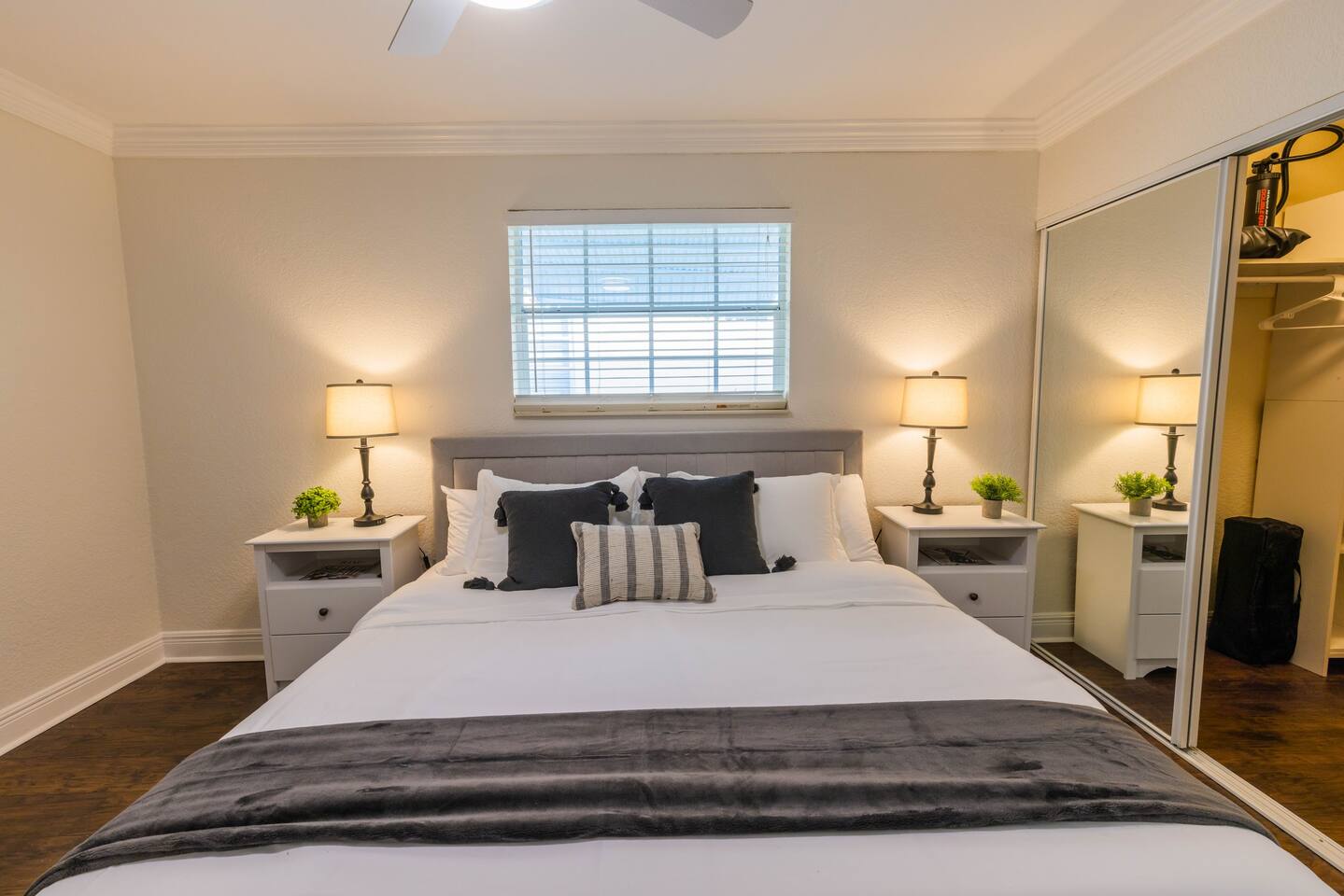 The 1st Bedroom has a King-sized bed, Smart App TV and large white dresser. It also has an en-suite bathroom with shower and new vanity. There is a great walk-in closet with a pack n play and sheets as well as inflatable mattress.