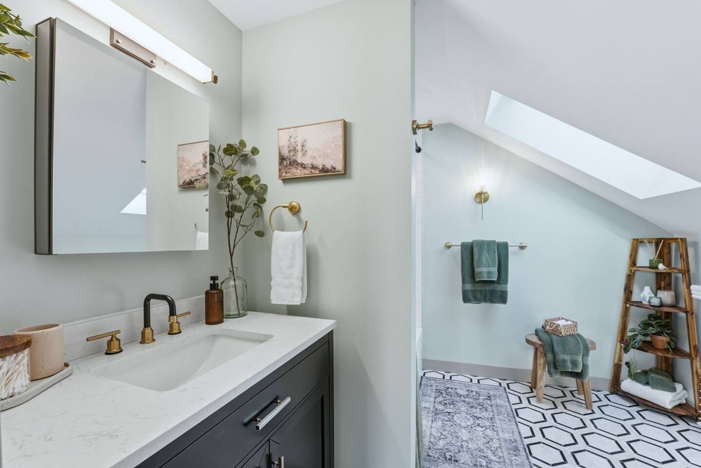 Modern bathroom with a sleek vanity and walk-in shower, thoughtfully styled with warm accents and a clean, calming design
