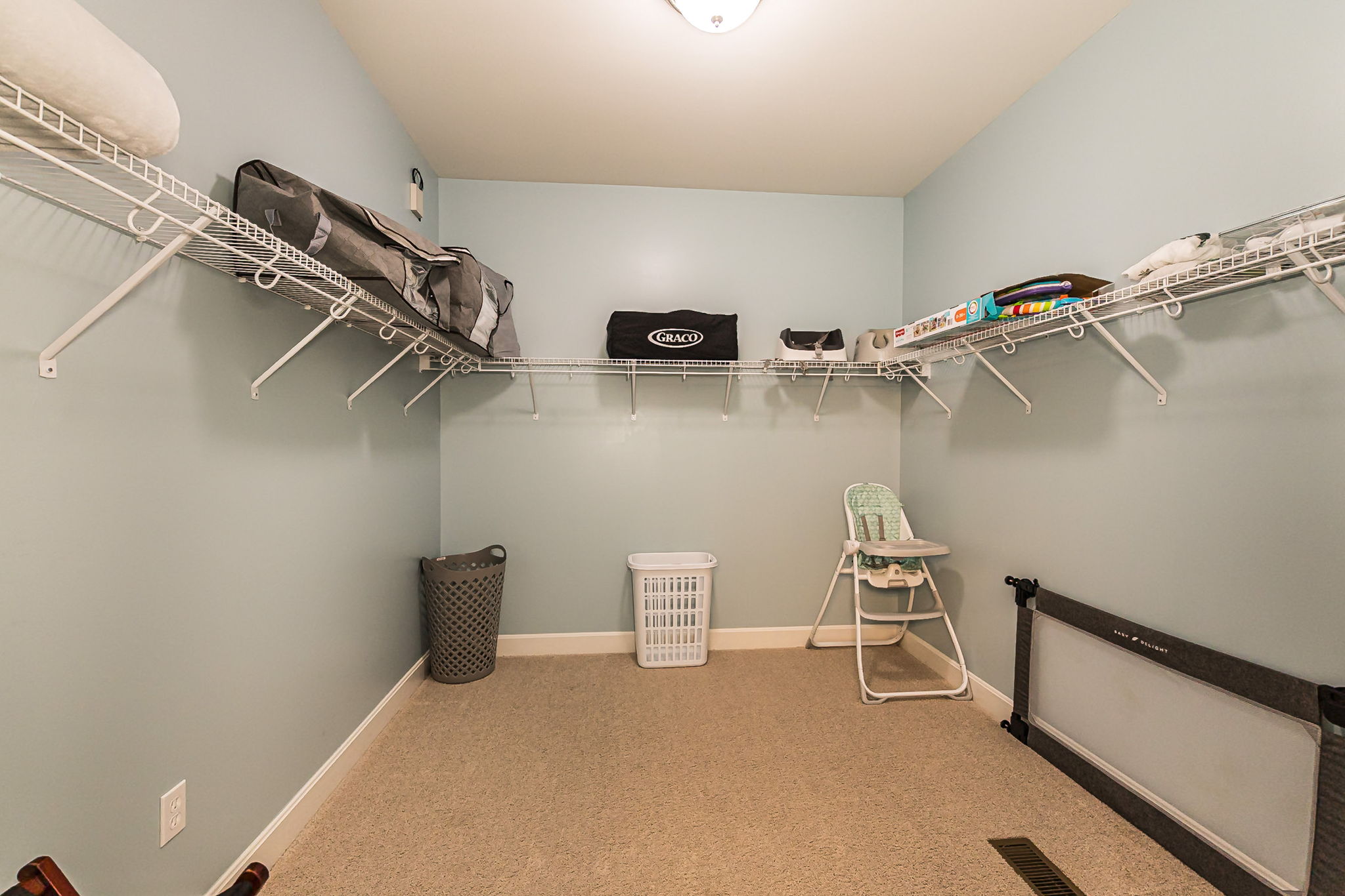 Walk-in closet provides plenty of room for luggage and hanging clothes. Queen air mattress, and Infant items provided.