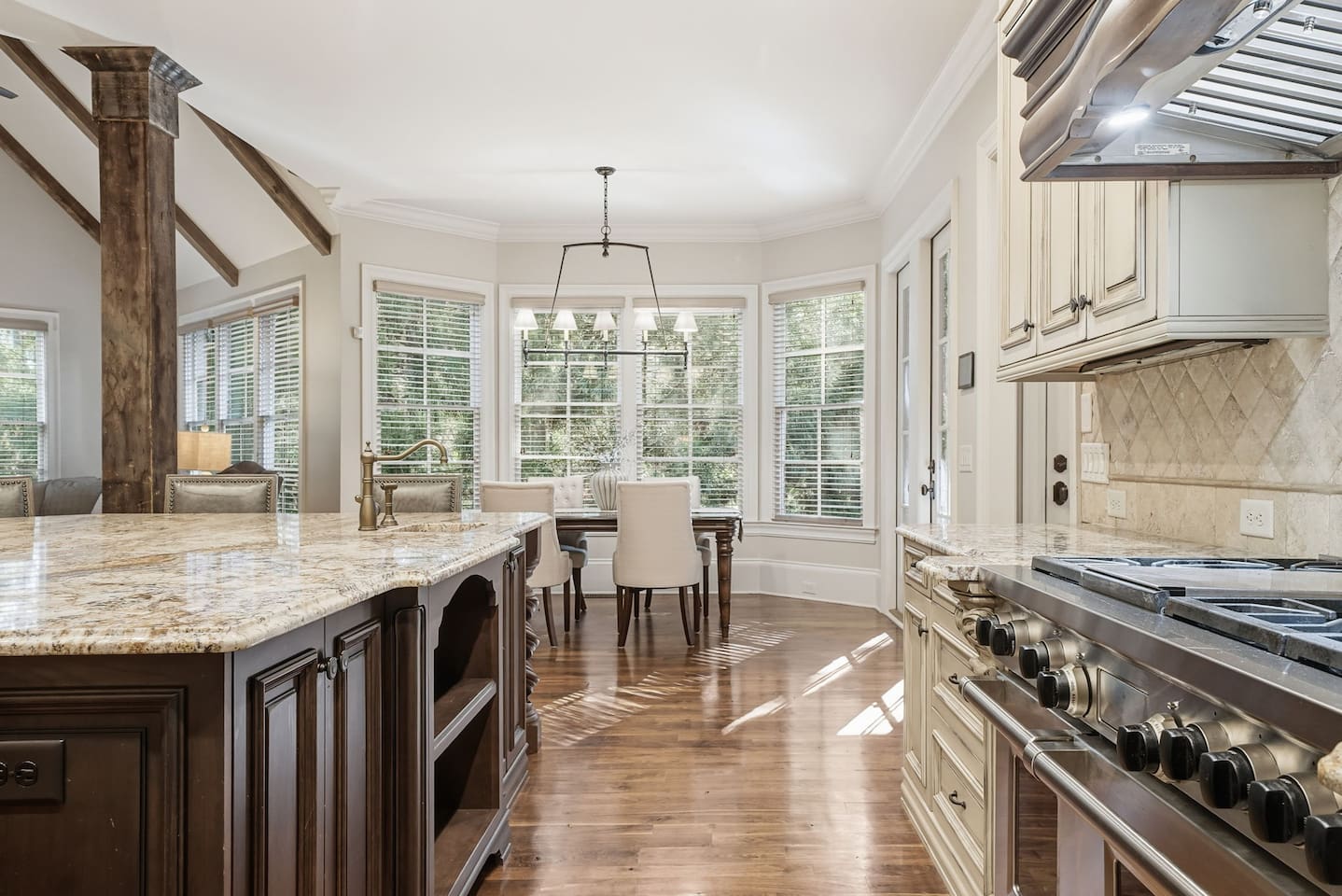 Cozy breakfast nook just off the kitchen, seating four comfortably. A warm, intimate space perfect for casual meals, morning coffee, or relaxed conversations.