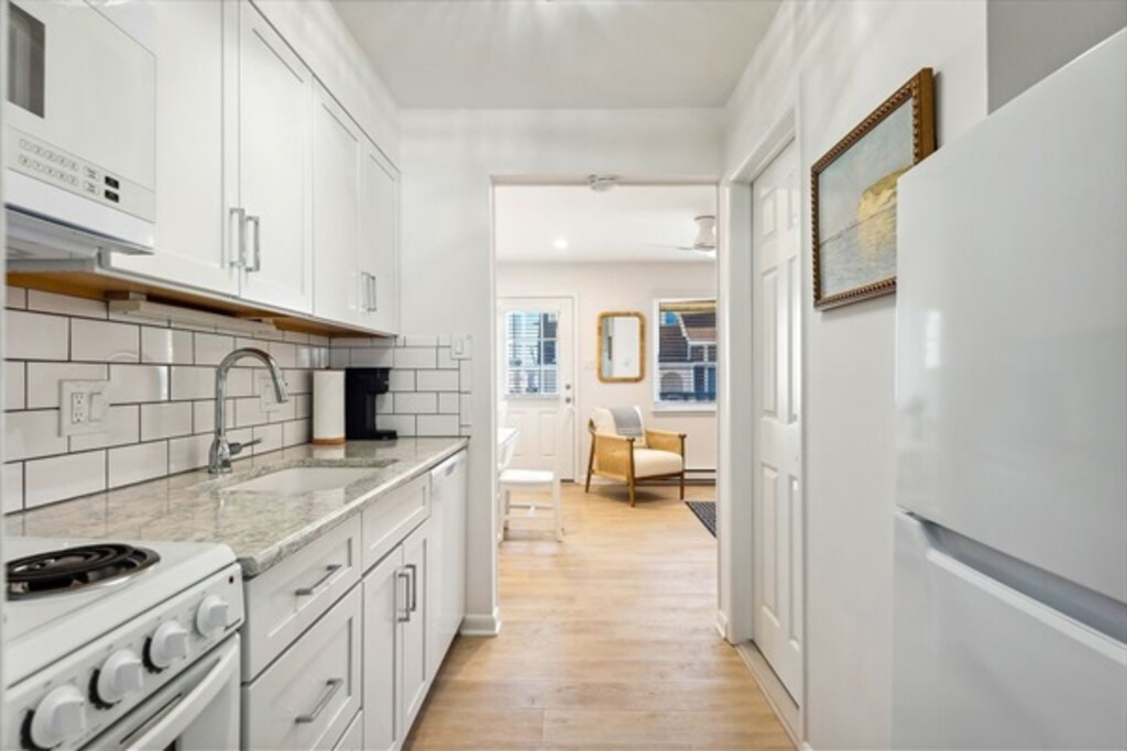 Seamless flow from kitchen to living area.