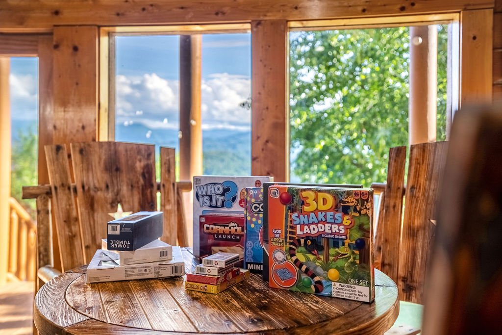 Gather around for the ultimate game night with classic board games and cozy mountain vibes.