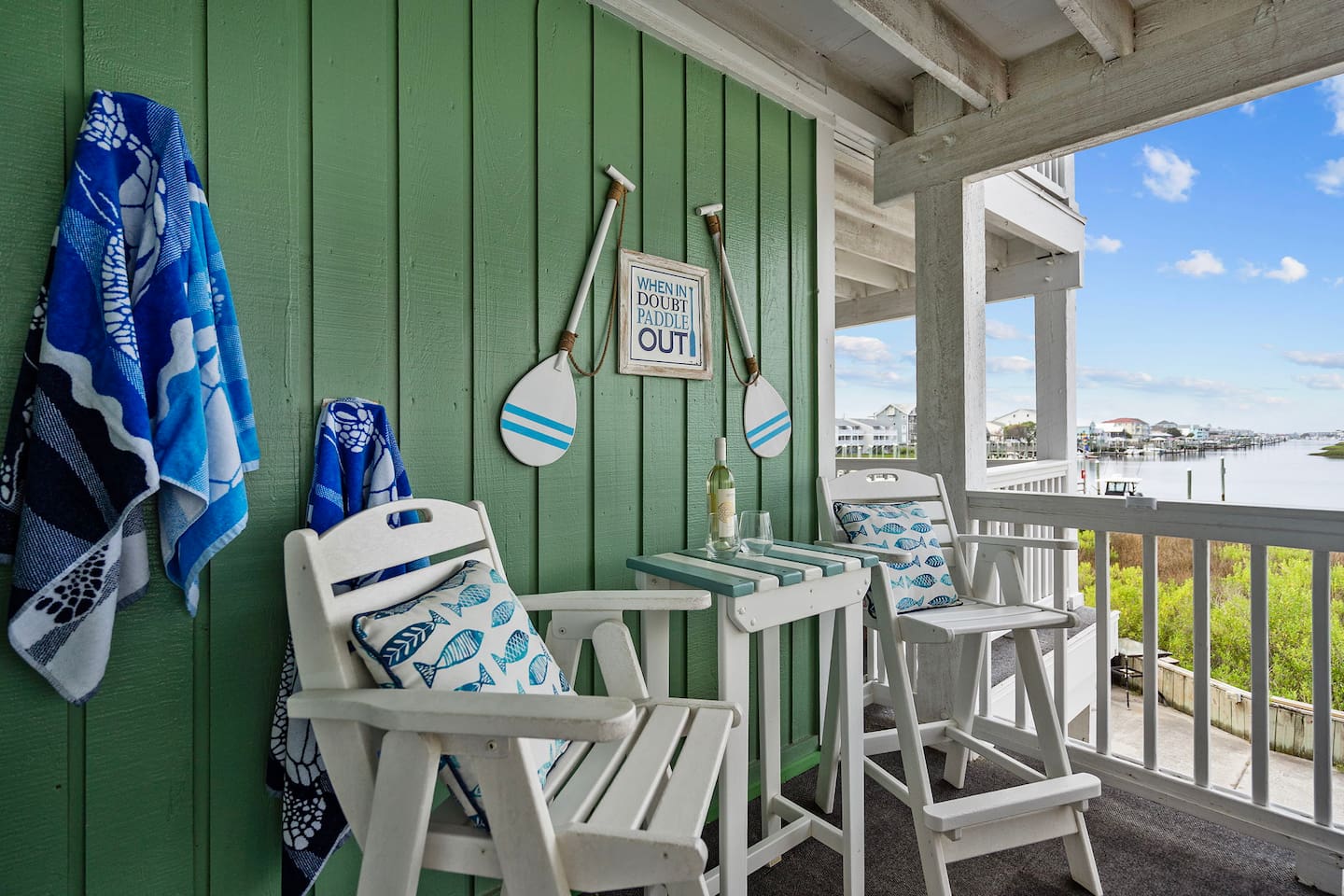Enjoy a drink and view in these matching captain chairs. 