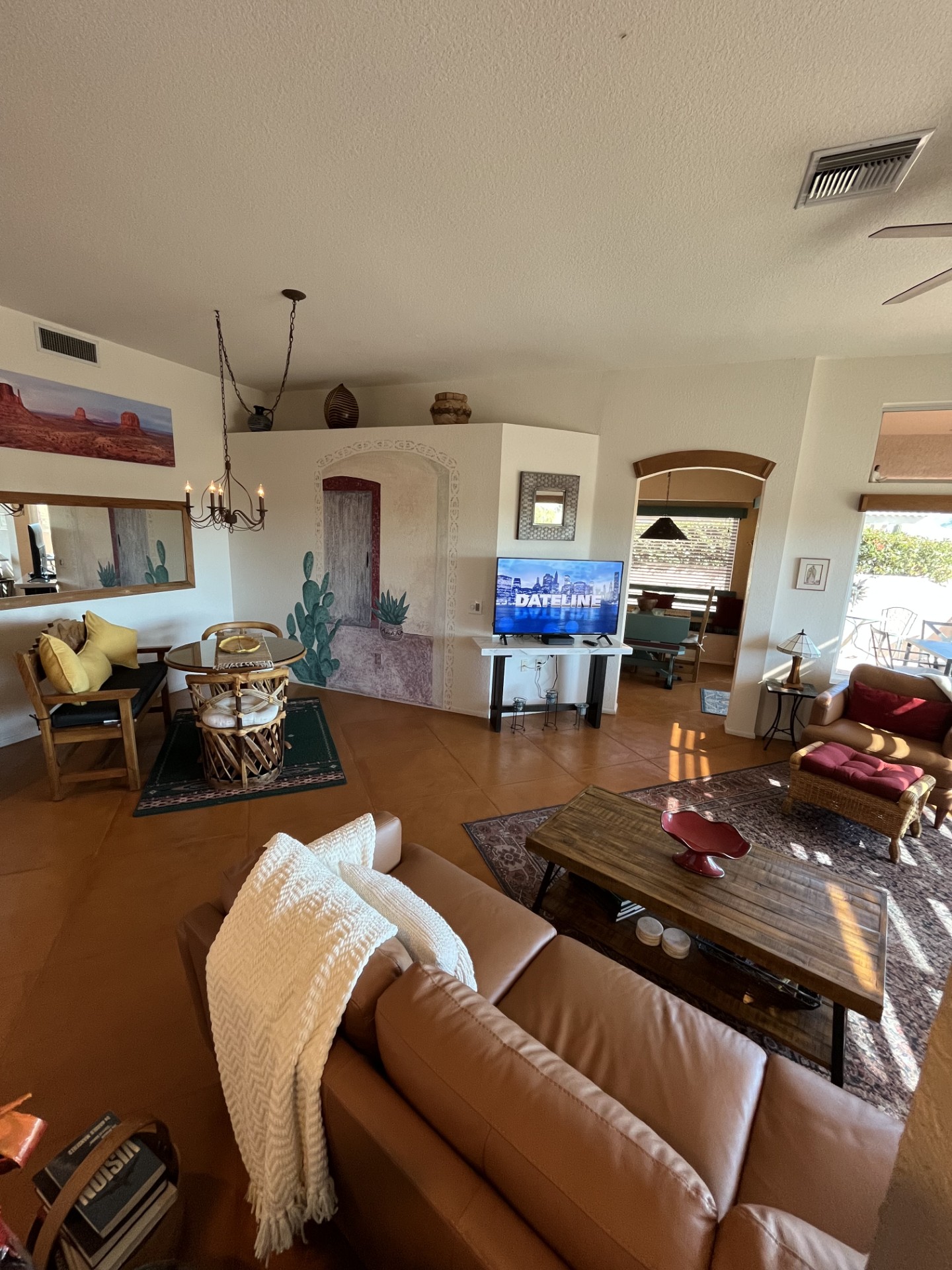 Living room Smart TV is 50 inches and offers basic cable channels and HD streaming options
