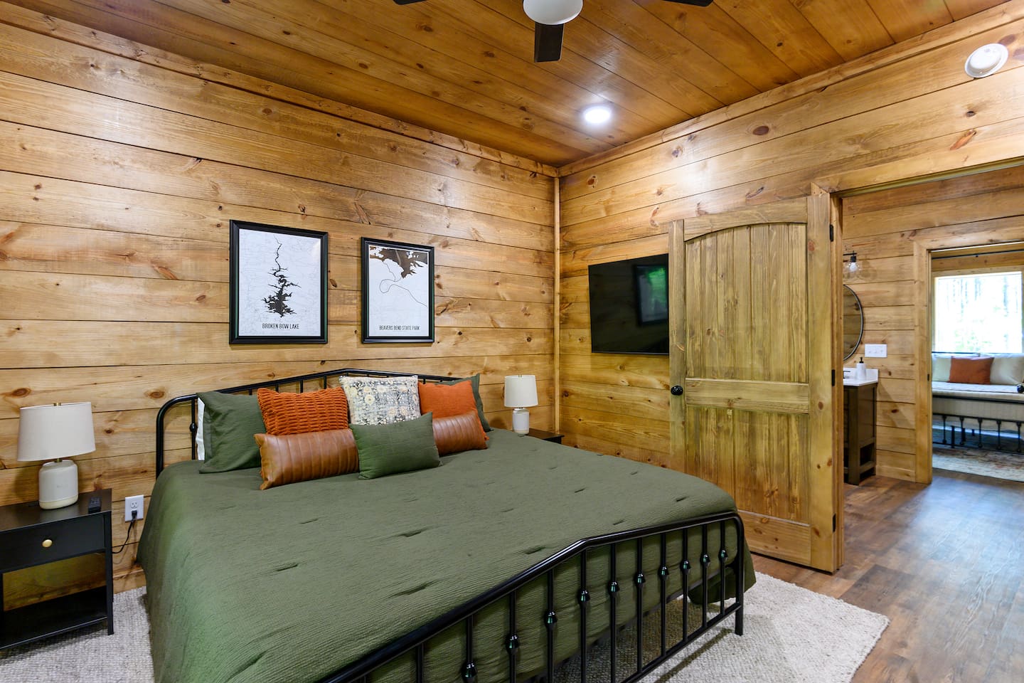 Soft linens, blackout shades, and rustic charm invite deep sleep and lazy mornings.