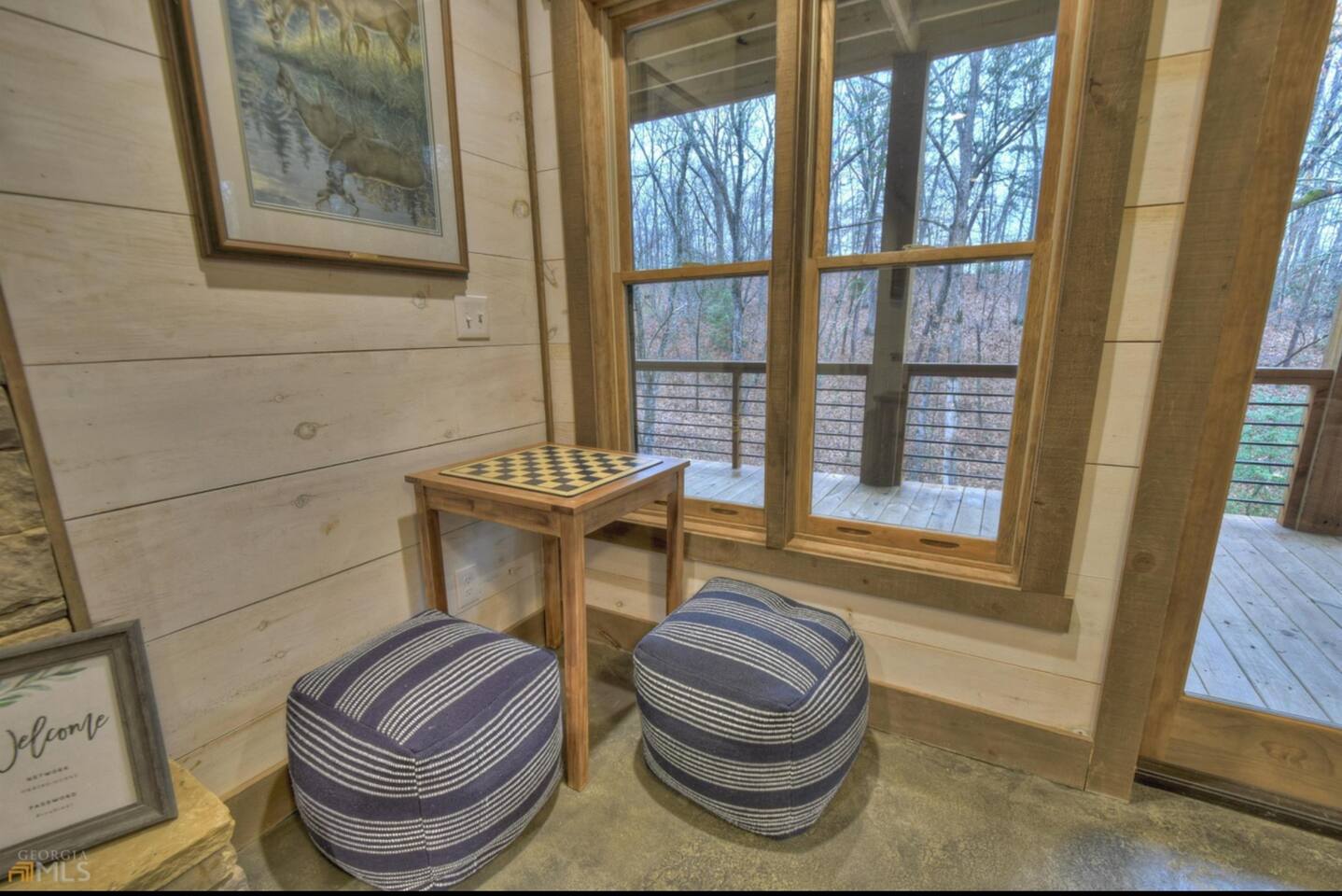 Basement game room has two game tables.  This one has checkers and chess.  The other is suited for board games or cards.