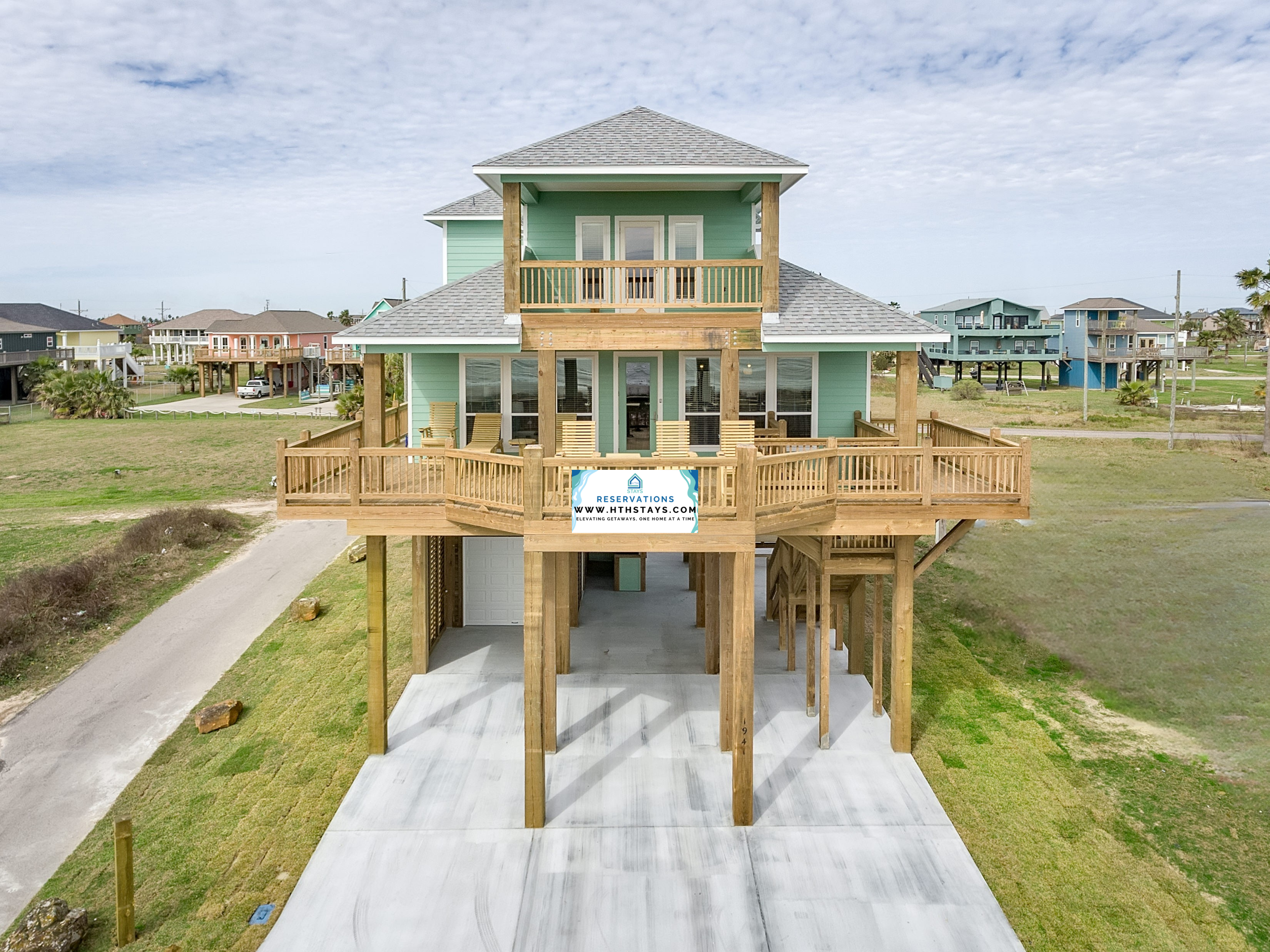 Welcome to Breezy Point, featured by HTH Stays. Elevated coastal home with spacious viewing decks, covered parking, and bright, breezy living spaces, perfect for relaxing by the shore.