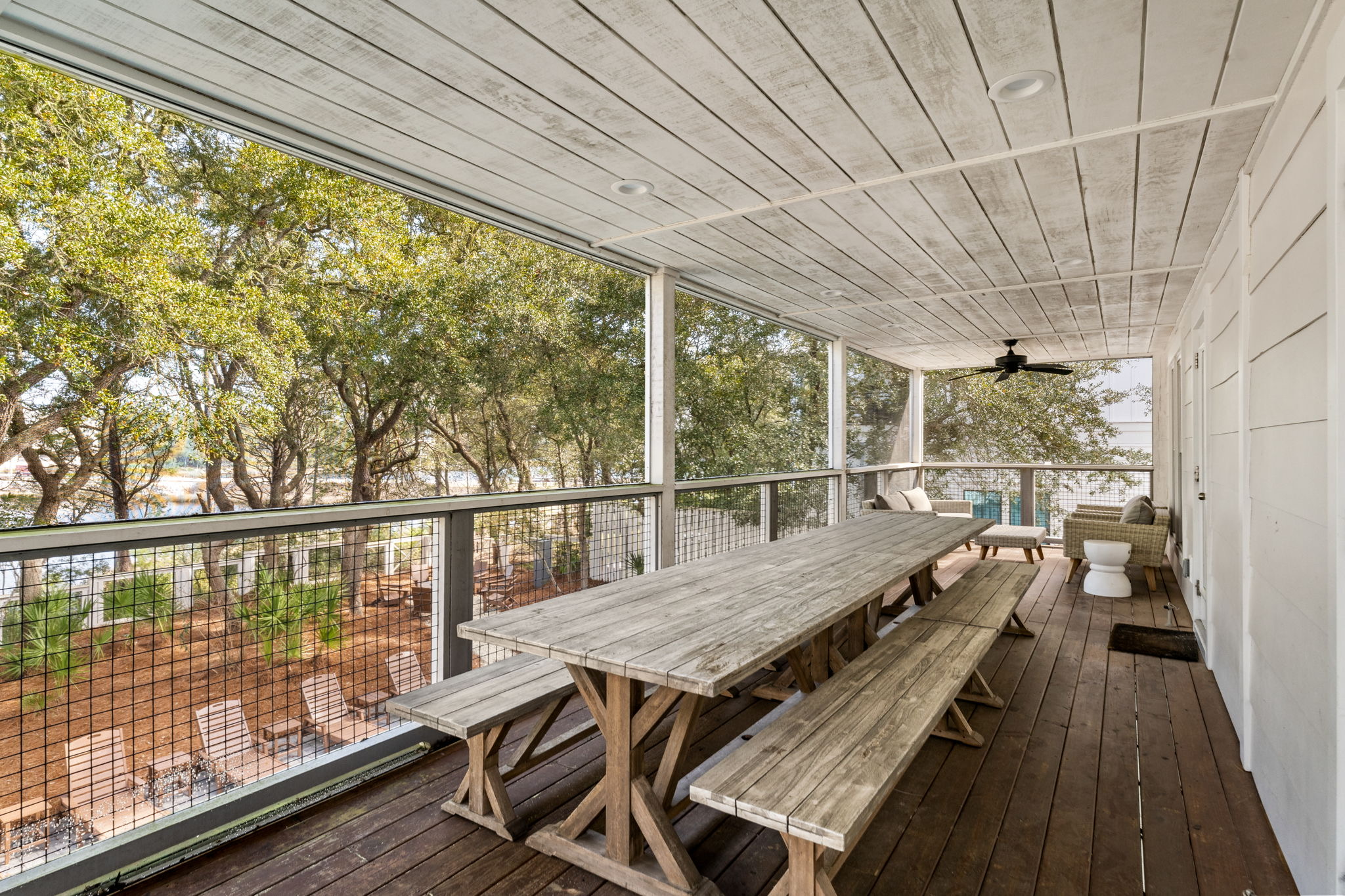 2nd Floor Screened-In Comfort: Enjoy the best of the outdoors without the pests. Our back screened decks offer a peaceful perch to watch the local birdlife on the lake with your morning coffee.