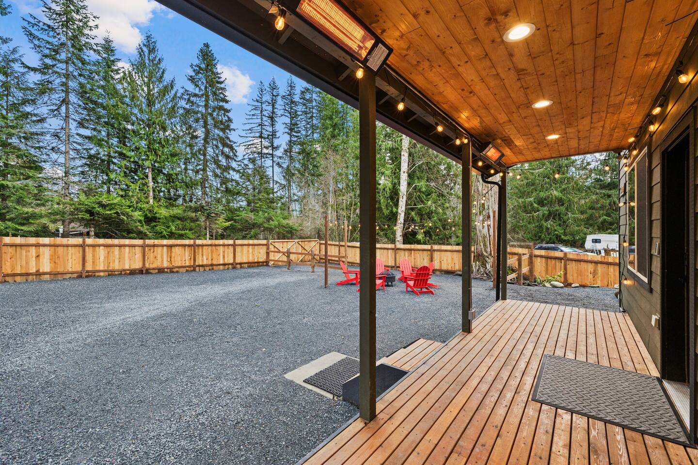 You will love the large fully-fenced frontyard  that offers total privacy. Enjoy the outdoors even in cold weather with an wood-burning outdoor fire pit as well as space heaters on the patio to keep you warm and toasty