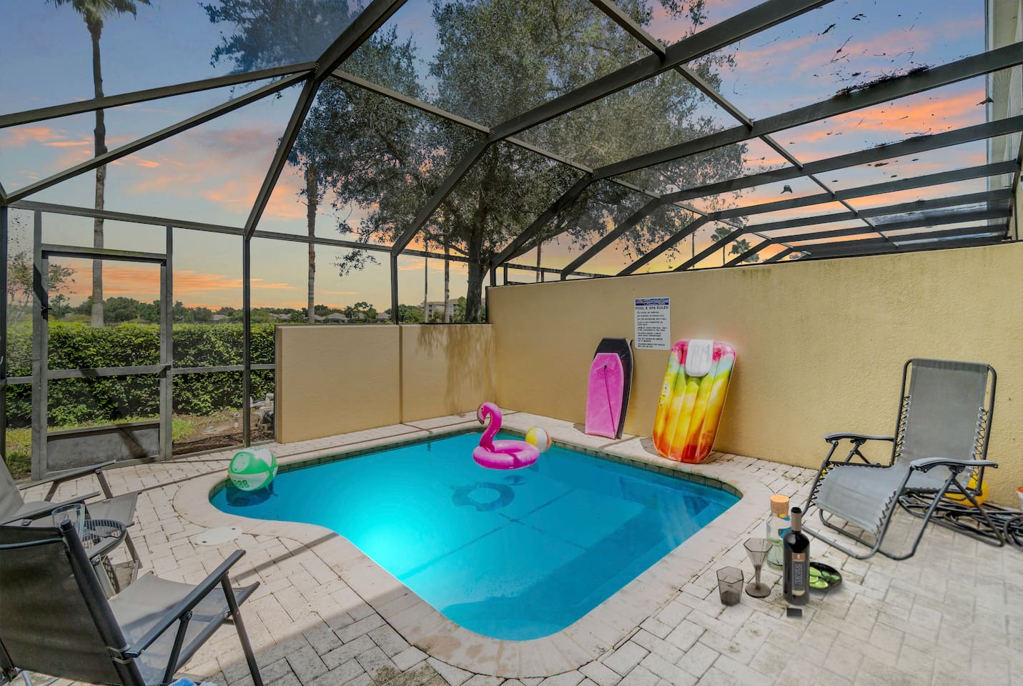 - Screen enclosed pool area with comfortable lounge chairs and pool toys  
- Relax with a refreshing swim or soak up the sun in a private setting  
- Perfect for family fun, poolside games, and evening dips under the sky  