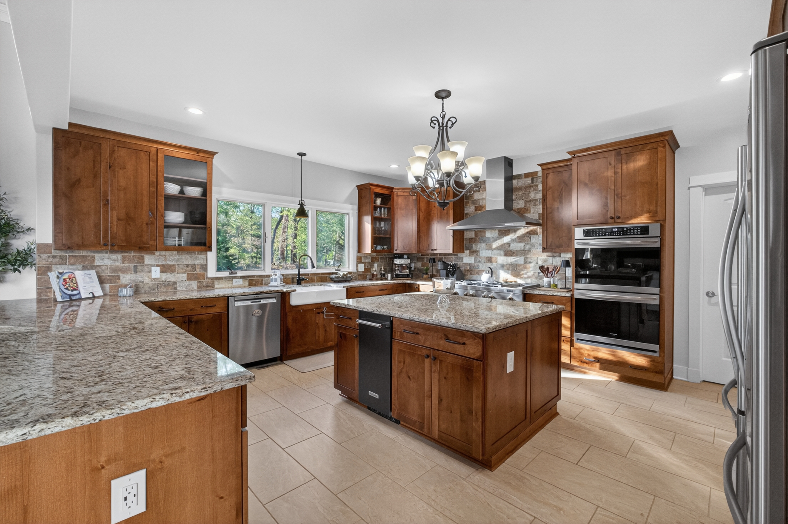 Spacious chef's kitchen with oversized island for gathering