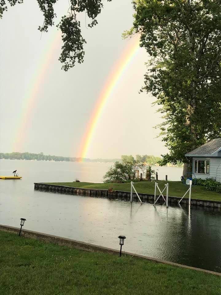 Rainbow over Paw Paw Lake — unforgettable lakefront moments.