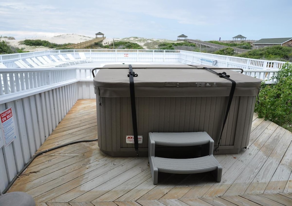 Relax in our hot tub on crisp OBX evenings, a warming touch to your destination.