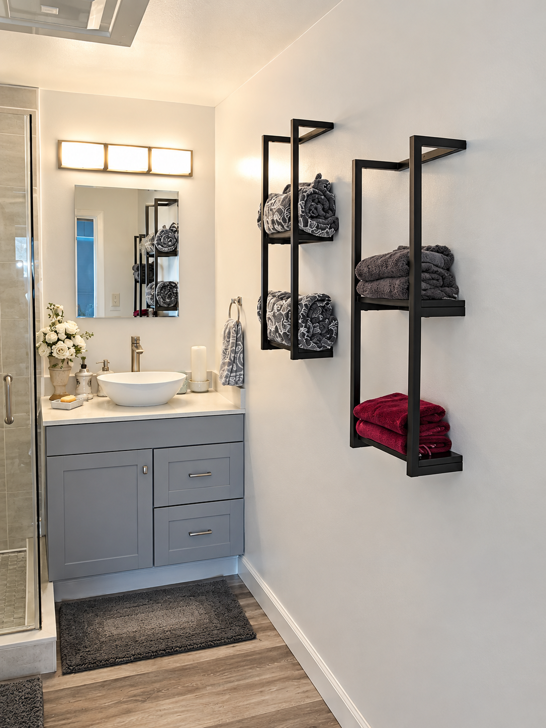Clean and comfortable bathroom with a walk-in shower, providing a convenient space to freshen up after a day by the lake.