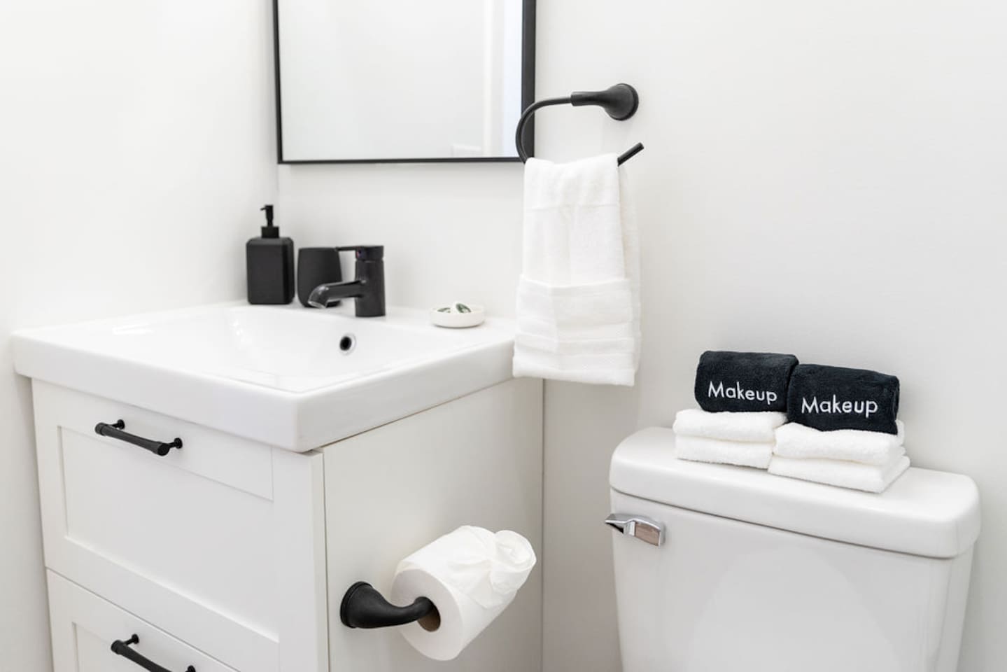 Toilet with a sink, providing a clean and functional space in the bathroom.