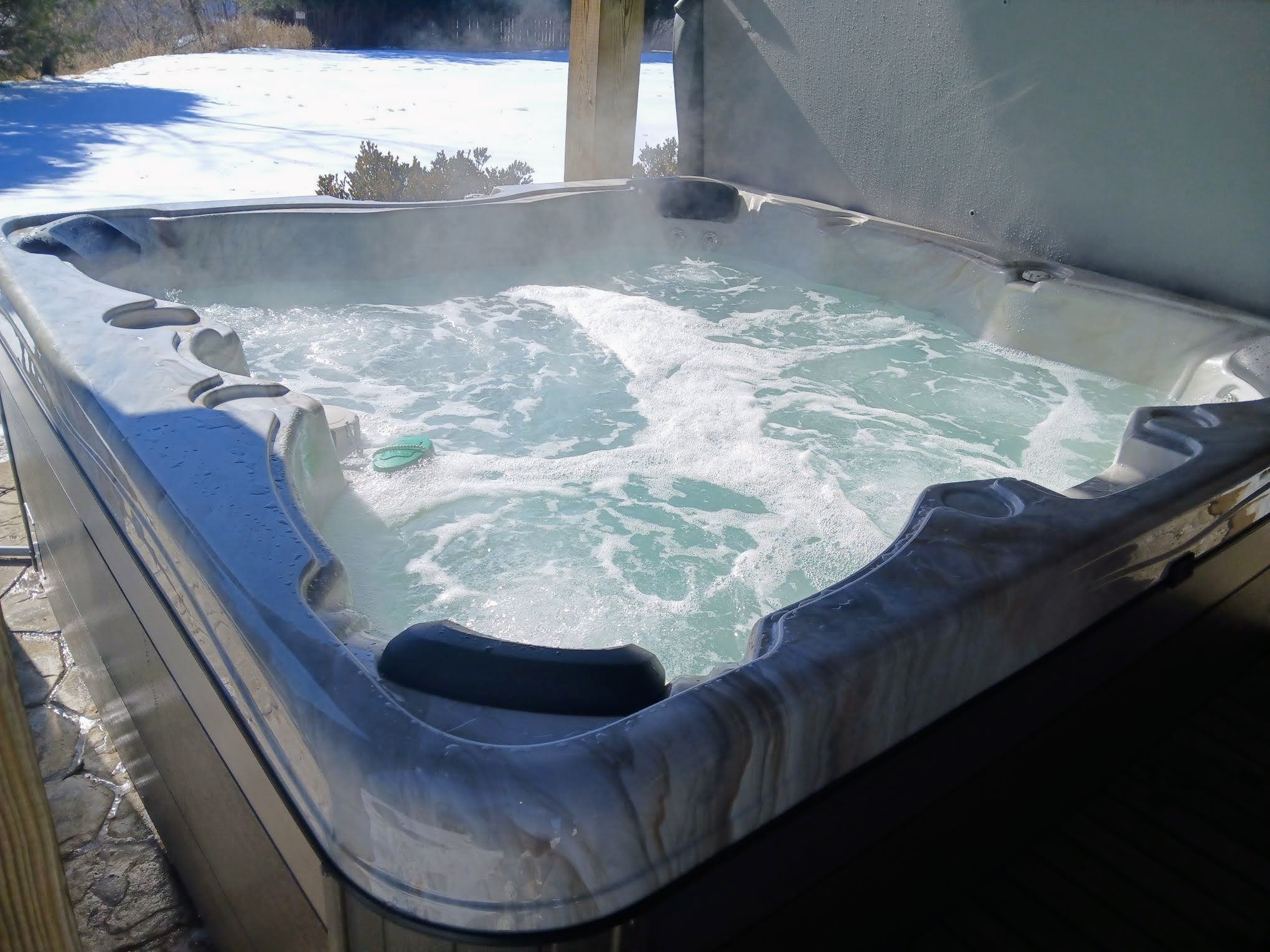 Brand new hot tub added in 2026, winter pic!