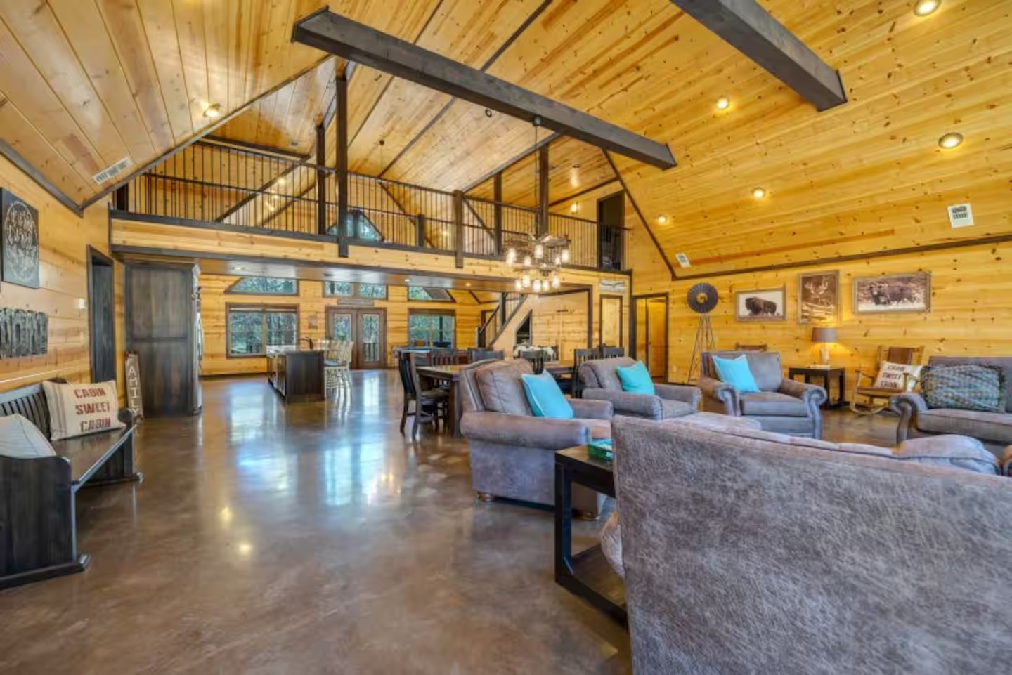 Spacious open-concept design where living room comfort, kitchen style, and dining togetherness all flow in one inviting space.