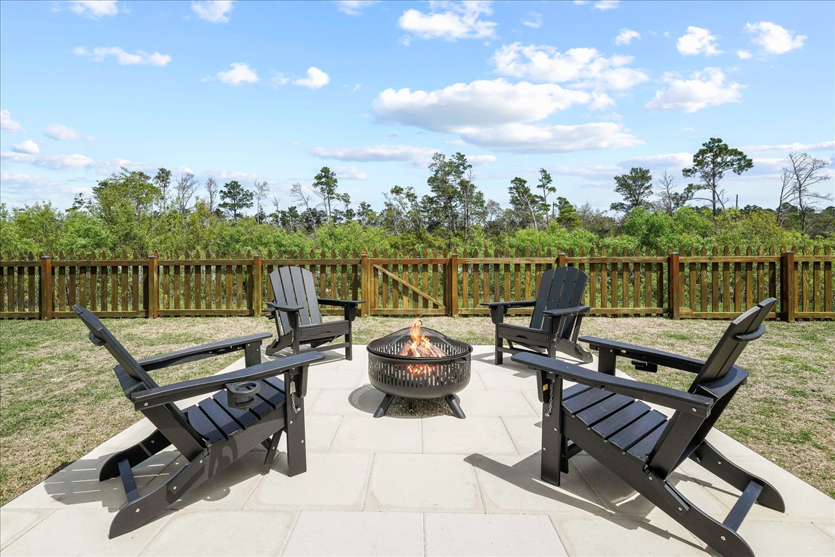 Cozy up by the fire pit and enjoy peaceful nights under the open sky