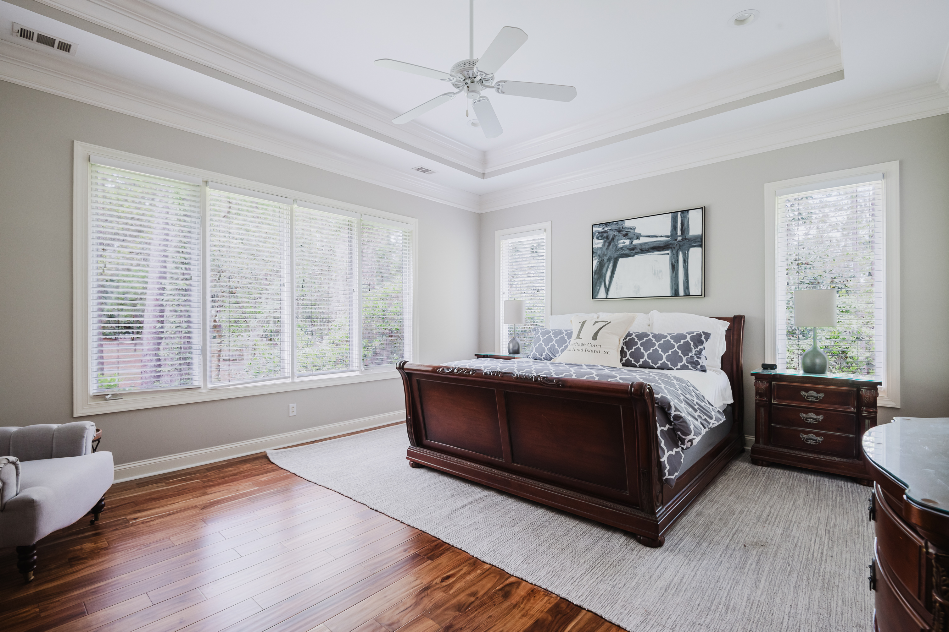 Primary bedroom features a king bed and premium bed linens; HD TV as well