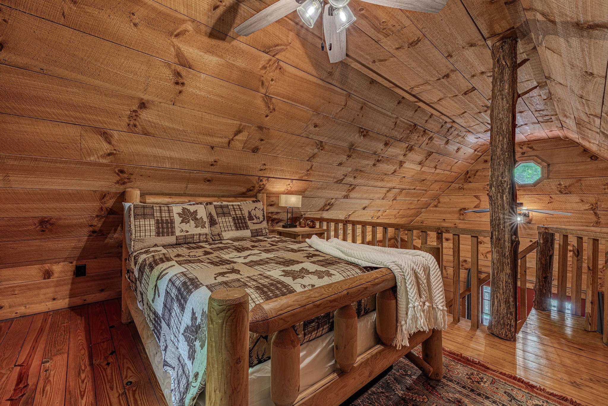 Vaulted wood ceilings make this room feel like a treehouse.